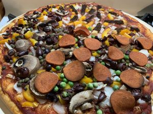 Made our own pizza with an Aver’s dough ball crust! at Aver's Pizza in Bloomington