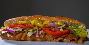 Classic Italian-
Pepperoni, Deli Slices, Lettuce, Tomato, Onion, Oil & Vinegar, Banana Pepper, and Garlic Aioli at Mashup Market -  BeHive Deli in Denton