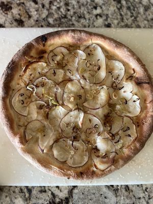 Pizza Verde’s potato and leek pizza, get it frozen from Mashup  at Mashup Market -  BeHive Deli in Denton