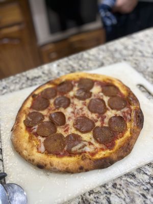 Pizza verde’s pepperoni pizza  at Mashup Market -  BeHive Deli in Denton