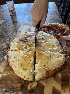 Deep dish cheesy garlicc  at Mashup Market -  BeHive Deli in Denton