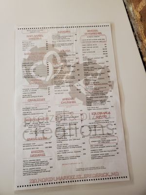 The front of the menu, July 2023. Vegan chocolate chip pretzels, pizzas,  and sandwiches. Has vegan Hershey's oatmazing ice cream. at Pretzel & Pizza Creations in Frederick