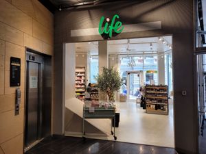 Shop front inside shopping centre at Life in Uppsala