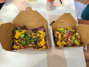 Nachos full on left half on right at Gaia's Garden Cafe in St George