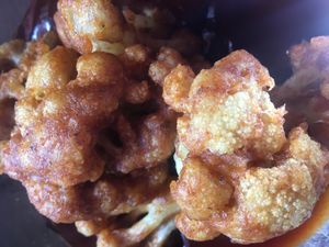 Succulent cauliflower  wings so crispy with our secret house blend of seasonings and spices you and you hear the  crunch sound when you bite into them little golden wonder 👌🏾 at 1218 in West London