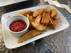 Papitas rústicas  at CactusBerry in Santiago