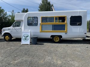 Facade with plenty of parking for customers at Preference in Anchorage