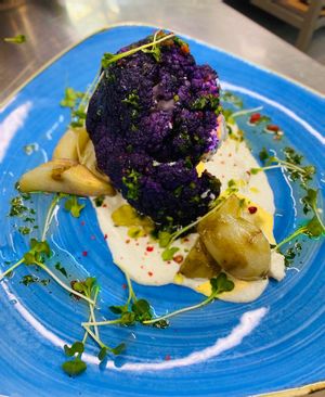 Violet cauliflower on vegan chimichurry and parsnip cream at Restaurant Aal Eechternoach in Echternach