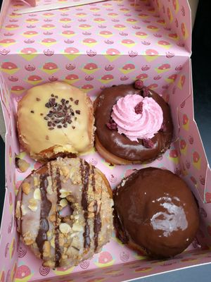 Passionsfrucht / Schoko mit Himbeercreme / Banane / Schoko mit Vanillepudding at Brammibal's Donuts - Friedrichshain in Berlin
