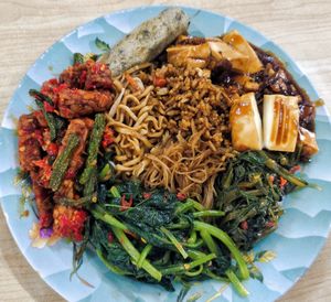 This cost rupiah21,000 (Singapore dollar $2 only) at Ariya Maitreya Restaurant 彌勒佛素食館 in Batam