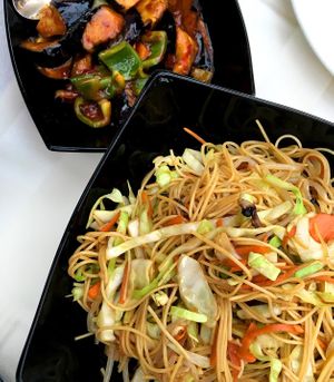Vegan chow mein: noodles, cabbage, carrot, mushroom, bean sprouts.
Upper part of the photo: Szechuan eggplant at Chloe's Chinese Restaurant in Paphos