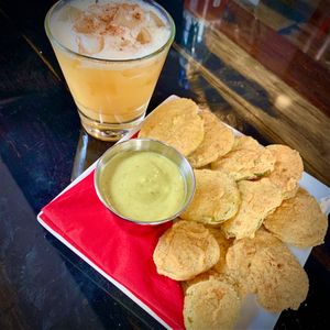 Vegan pickle chips with avocado crema  at Tailgate Sports & Pizza in Bar Harbor
