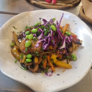 Wok with crispy soya pieces, noodles veggies in a very tasty sauce at Kozy Eats  in Riga