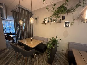 Restroom entrance & cosy area   at Kozy Eats  in Riga