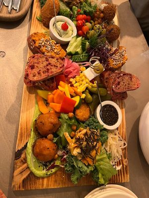 Starters plate, nice for a couple. The lemon pasta with vegan parmezan wasn't photographed, but was excellent. at Kozy Eats  in Riga