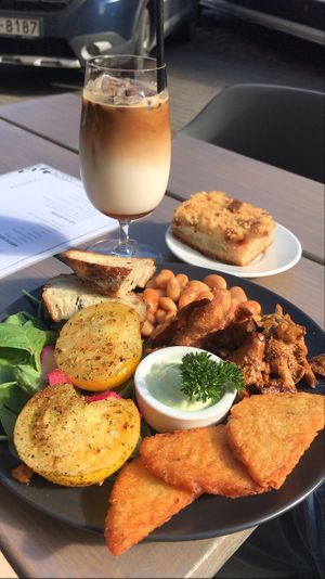 english breakfast and rhubarb cake  at Kozy Eats  in Riga