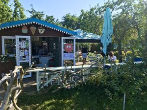 Cute little bar with garden and view on the lagoon  at Mikė ir Vanilė in Juodkrante
