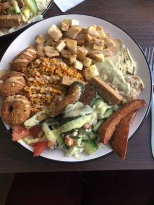 Mixed plate with manioc fries, falafel and tofu  at Ibras in Dresden