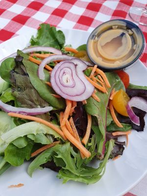 Side salad with peach balsamic  at Caroline's Restaurant at Wine Country Inn in Palisade