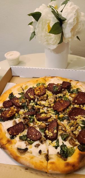 White vegan pepperoni pizza at The King's Feet in Berkeley