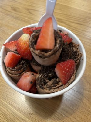 Chocolate rolled icecream with Oreos and strawberries   at Creme Shack in Greenville