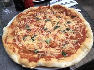 Pizza with vegan mozzarella and extra basil   at PURiNO in Moenchengladbach