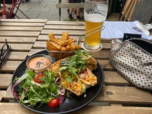 Burrito with beyond meat and "papír" beer. at Pivstro in Plzen