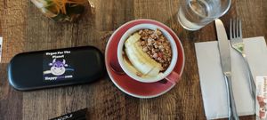 small bowl of granola and fruit at Maison Sukoon in Paris