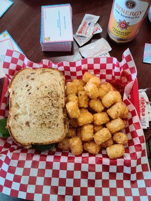 Chicken Salad Sandwich with a side of Tots at Tree Hugger Plant-Based Kitchen in Kansas City