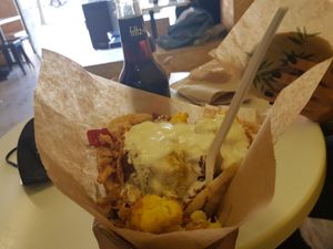 Loaded pita and fritz cola at Falafel Pedralbes in Barcelona