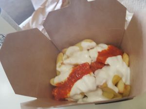 Spicy garlic fries at Falafel Pedralbes in Barcelona