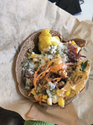 Loaded pita falafel at Falafel Pedralbes in Barcelona