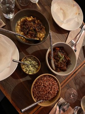 Cashew curry, eggplant curry, plain hopper, green pol sambol and red rice   at Lankan Filling Station in Sydney