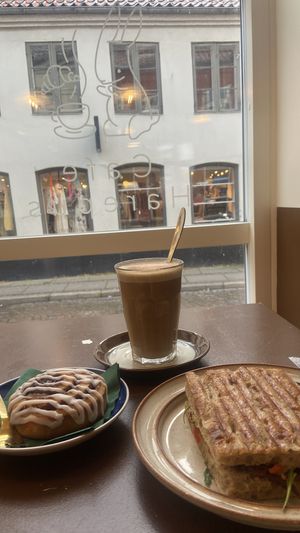 Pumpkin spice latte, focaccia sandwich and cinnamon roll   at Cafe Harepus in Aarhus