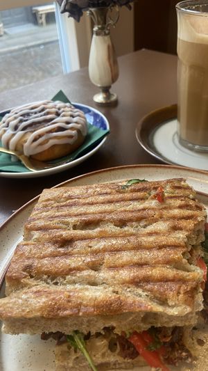 Pumpkin spice latte, focaccia sandwich and cinnamon roll   at Cafe Harepus in Aarhus