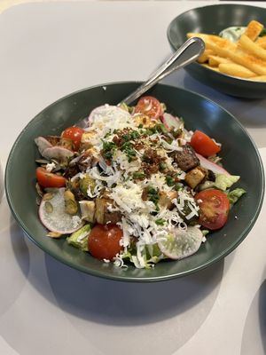 Caesar salad & fries at Veg Machine in Tartu