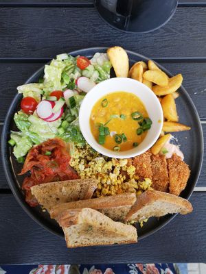 All day breakfast with curried beans. It was bigger than it looks on the photo. at Veg Machine in Tartu