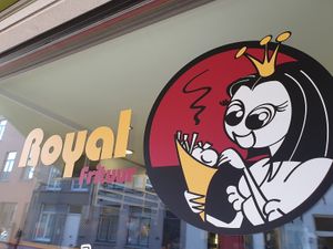 logo on window at Royal Frituur in Bruges