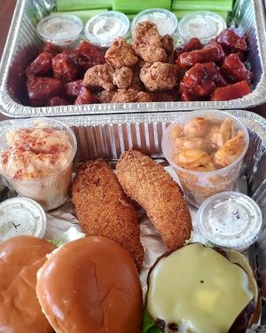 Wing Pack 
30 vegan wings,
Fish Sandwich 
Chicken Sandwich 
Vittles Mac and cheese
Potato Salad 
 at Topknotch Vegan Vittles in Independence