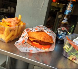 had it 'to-go' so it's not a very good pic but this burger was amazing and the curry veganaise sauce on top of the fries was stellar. I also had their chocolate donut (I'd have another thank you) and the potato tortilla on the left was also a good appetizer  at Gopal - Vegan Deli in Barcelona