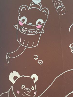 Cute wall painting at Gopal - Vegan Deli in Barcelona