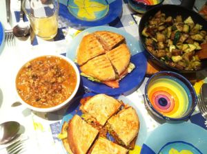 Final meal in Barcelona with take-out deliciousness; burger & sandwich from Gopal, soup from Vegetart and veggie stir fry from leftover veggies.  at Gopal - Vegan Deli in Barcelona
