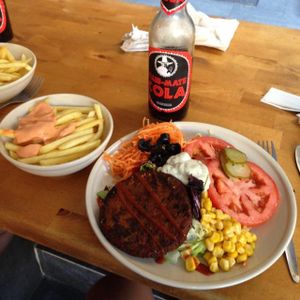 Burger with salad  at Gopal - Vegan Deli in Barcelona