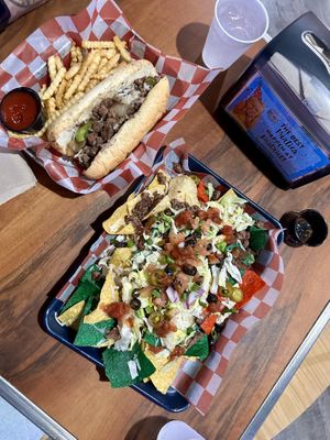 Impossible Philly and Vegan Nachos  at District Eat & Play in Oviedo
