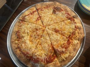 Cheese pizza. You can add toppings if you want.  at District Eat & Play in Oviedo