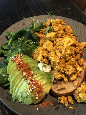 Tofu scrambled with avocado on sourdough bread  at Lilith Coffee in Rotterdam