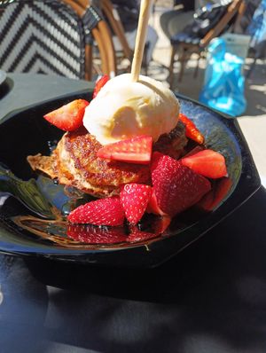 Pancakes with strawberries topping at Lilith Coffee in Rotterdam