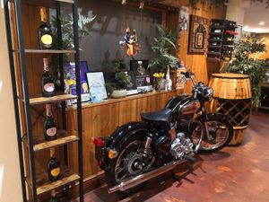 Vintage motorbike on display inside. at Shivalli in Leicester