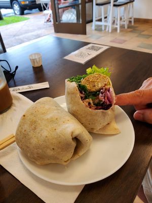 Oops took a bite already... lol. at Sprout Vegan Cafe in Kihei