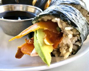 The Philly Roll with brown rice, smoked carrot 🥕 “salmon”, house cream cheese, avocado 🥑 and cucumber 🥒 at Sprout Vegan Cafe in Kihei